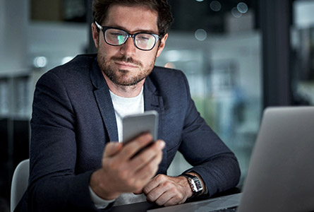 man looking at phone