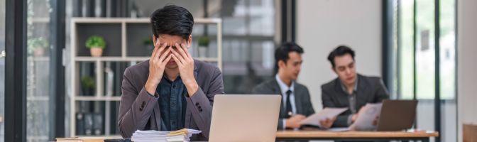 man focusing on computer