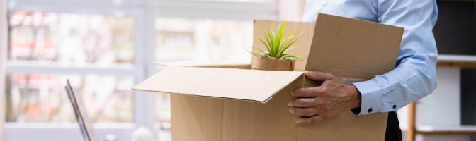 Employee packing up desk