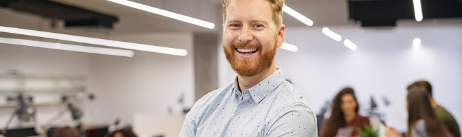   Save Download Preview Happy successful businessman standing in office.