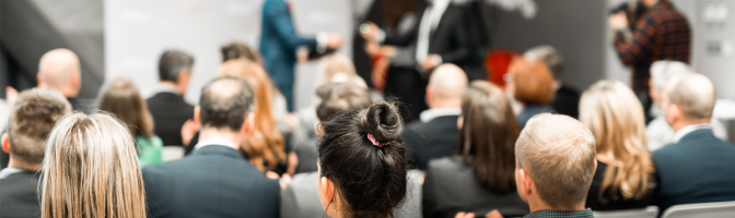 Business team leader receiving award prize at business award ceremony event.