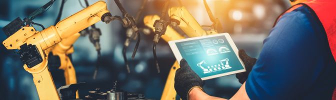 factory worker using tablet with internet connection