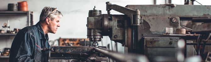 man in a metal working shop