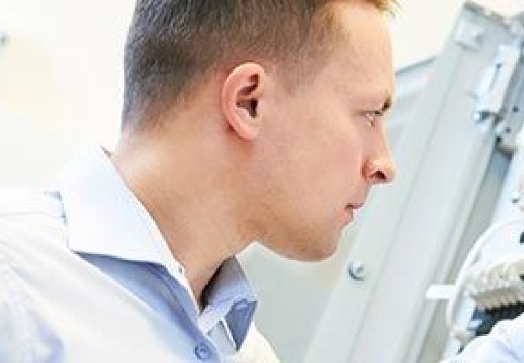 technician working on a router