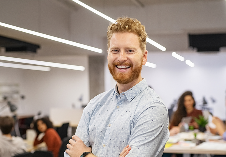   Save Download Preview Happy successful businessman standing in office.