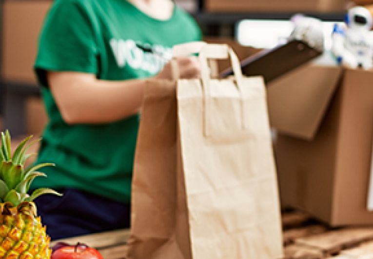 A person sorting donation items.