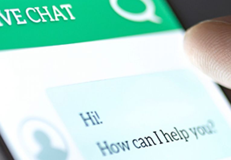 Closeup of mobile phone screen showing a live chat session.