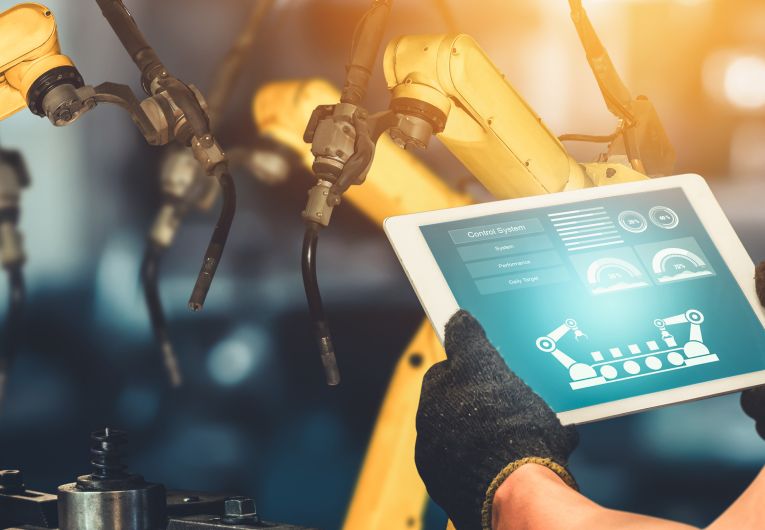 factory worker using tablet with internet connection