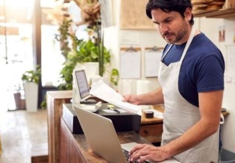 Small Business owner doing paperwork