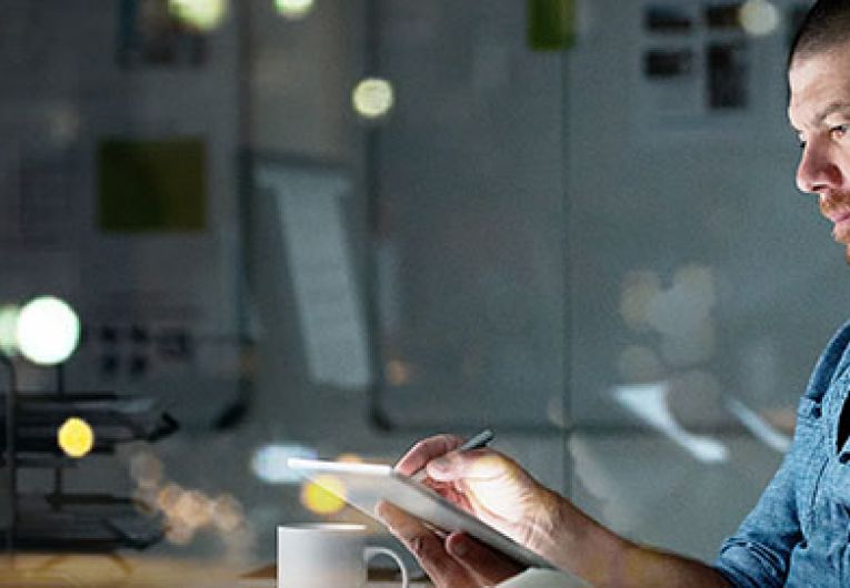 man working at computer in office