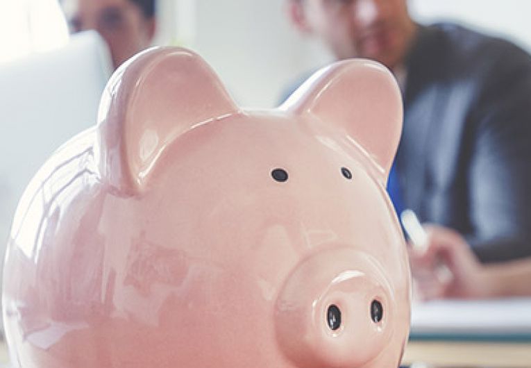 close up of a piggy bank on a table