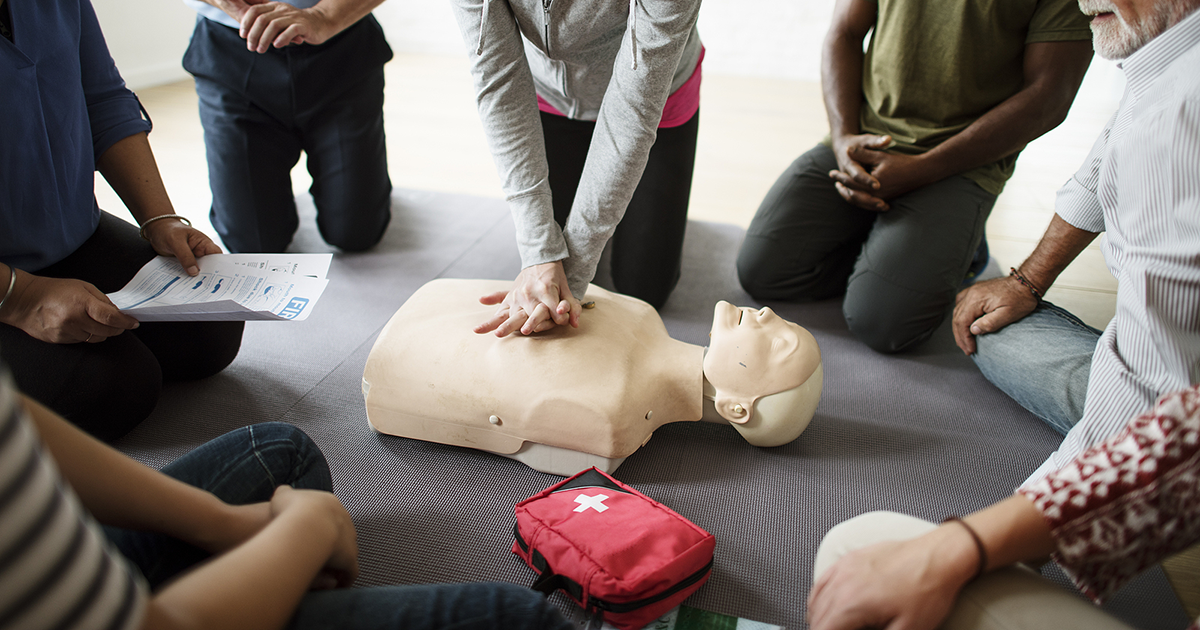 Group of employees doing CPR training